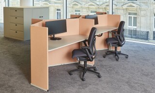 Individual workstations with ergonomic office chairs