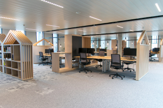 Hybrid office design with customised wooden desks