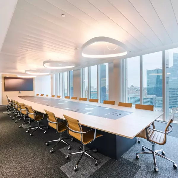 Meeting room with large conference table and audiovisual support